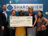 Sharonview delivers check to American Cancer Society at the Florence branch