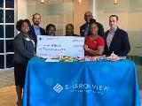 Sharonview delivers check to Sisters at Heart